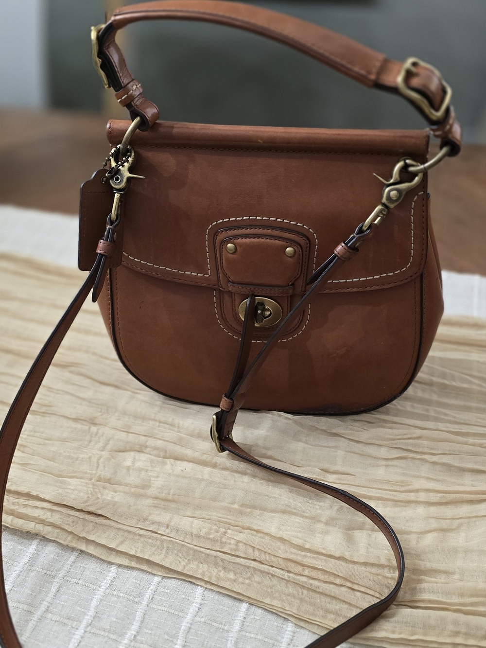 COACH Brown Leather Saddle Crossbody Bag - Classic Everyday Style